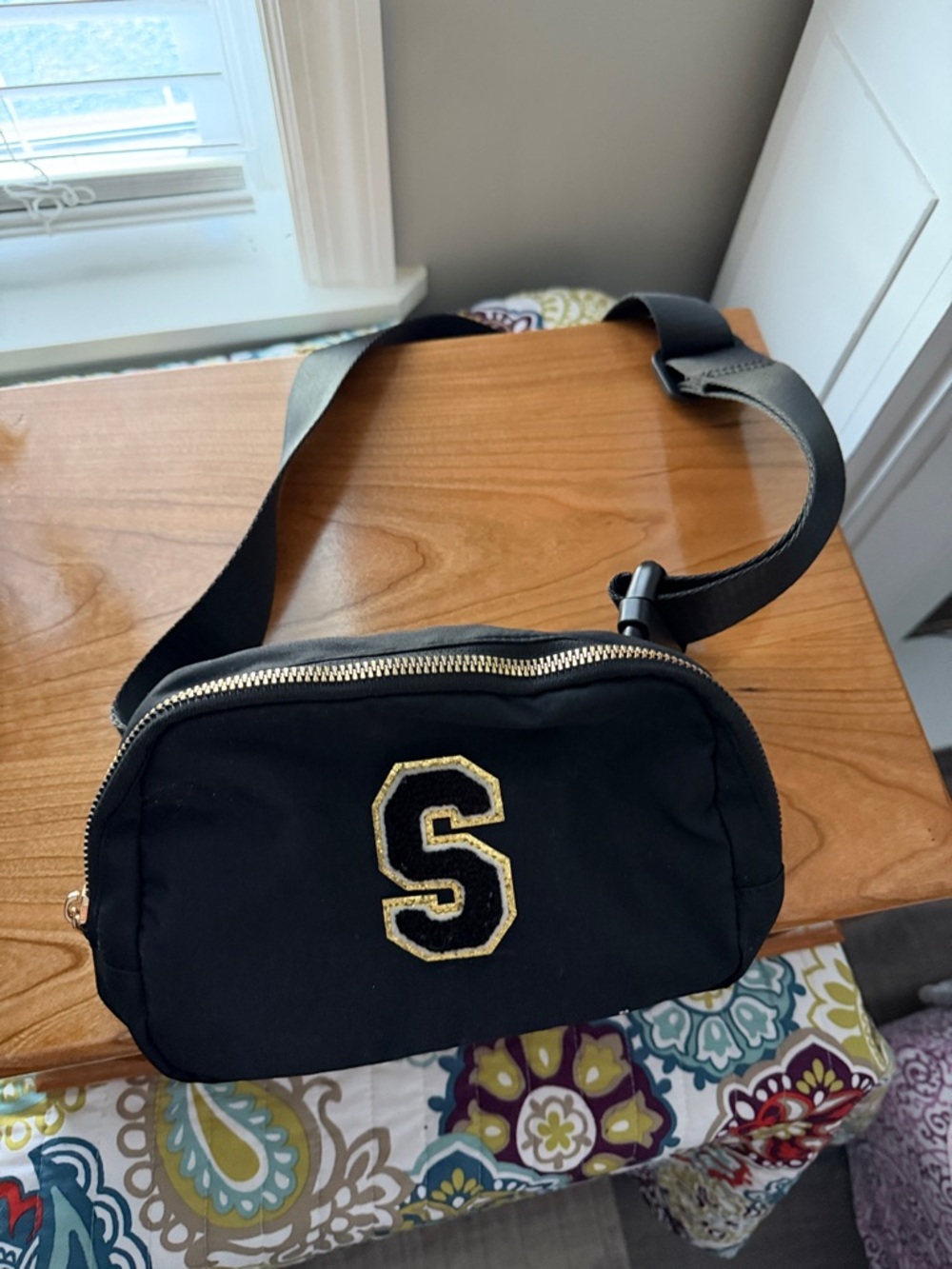 Black Crossbody Belt Bag with Gold 'S' Patch
